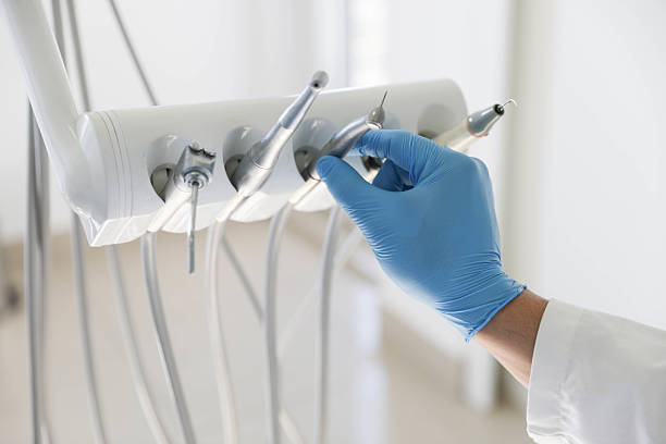 Professional Tooth Extraction technician working in Mecosta County County, MI